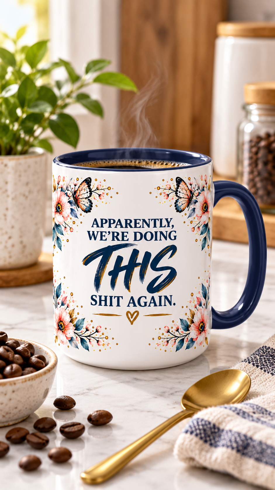 A white ceramic coffee mug with a navy blue handle and rim, decorated with colorful butterflies and flowers. The mug features the text 'APPARENTLY, WE'RE DOING THIS SHIT AGAIN.